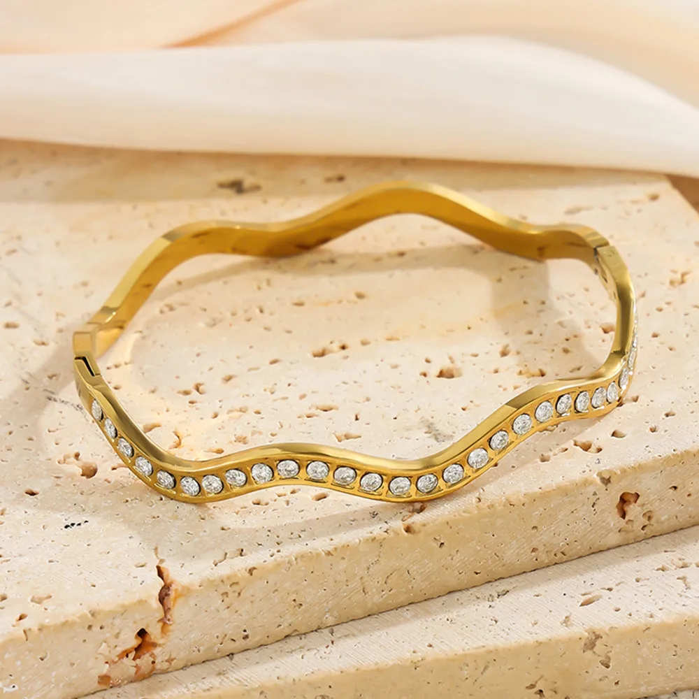 Ingemark Inlaid Rhinestone Stainless Steel Bangle Bracelet for Women 18K Gold-plated Wavy Cuff Spring Bangle Waterproof Jewelry