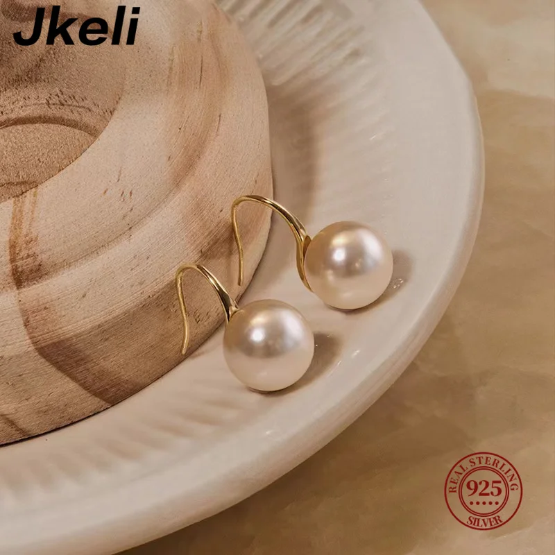 

Jkeli 2024 New Senior Sweet Exquisite Pearl Water Drop Profiling Earrings Elegant Fashion