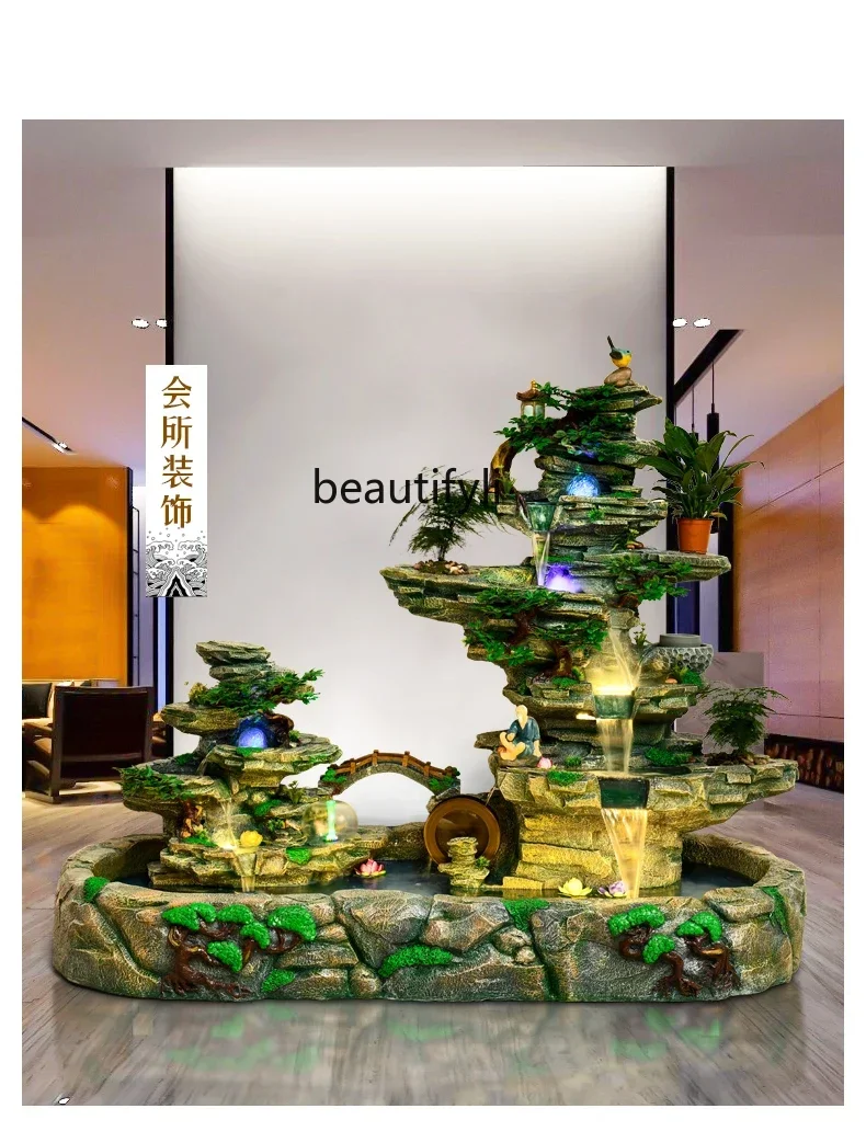 Large rockery flowing fountain ornament fish pond villa hotel outdoor courtyard water view