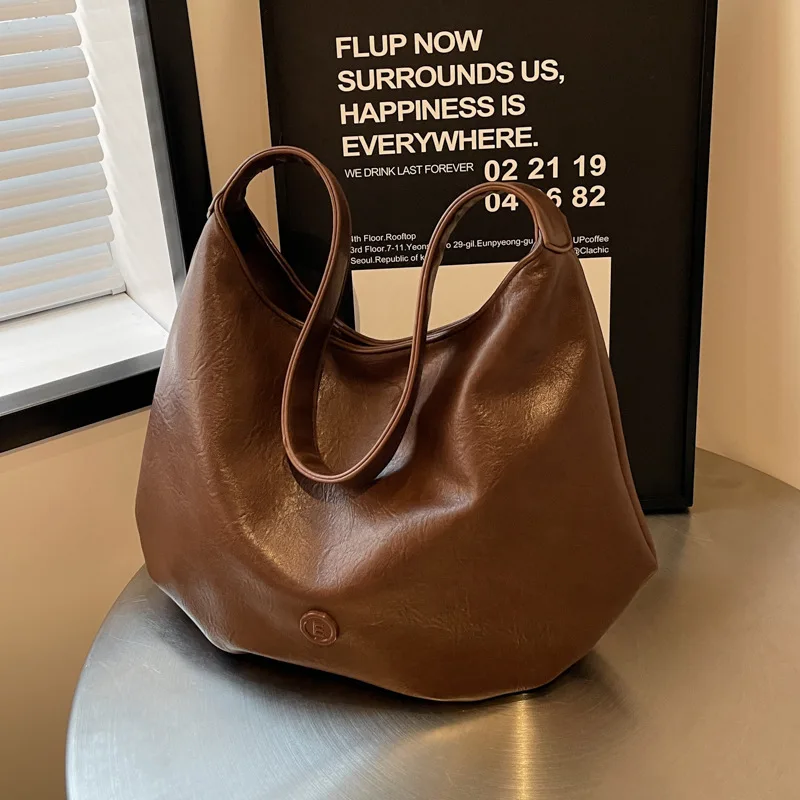 Bolso de mano de un solo hombro para mujer, bolso de mano de alta gama, versátil, multifuncional, portátil, Simple, viaje