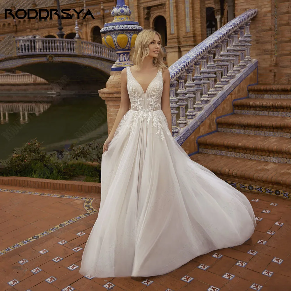 Roddrsya bohème sans manches dentelle robe de mariée a - word double V - neck robe de mariée de mariée incrusté personnalisé Ivoire tulle balayage jupe avec zip Phantom robe de mariée sans dos 2024