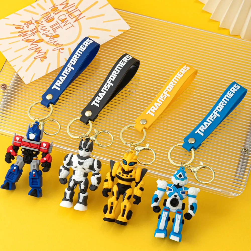 الكرتون فيلم محول مفتاح سلسلة أوبتيموس برايم نحلة روبوت سلسلة مفاتيح سيليكون سيارة مفتاح سلسلة حقيبة قلادة كيرينغ الأصدقاء