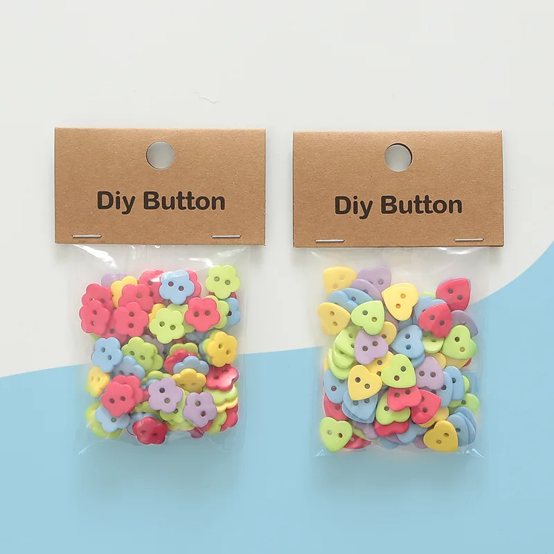 Bunte zweäugige Pflaumenblüte Liebe Harz Student Knöpfe Diy handgemachte Blumenknöpfe Student Knöpfe Kreativität