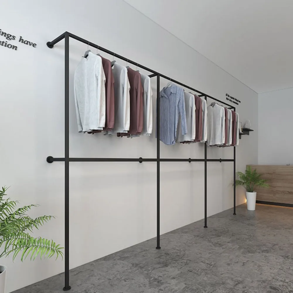 

Double layer hanging racks on the walls of clothing stores, display racks for suits and pants in wedding clothing stores, and di