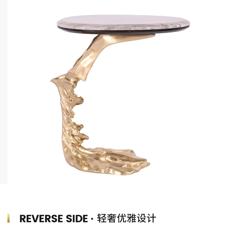 Living room sofa next to water ripple edge transparent resin small round coffee table marble copper corner table