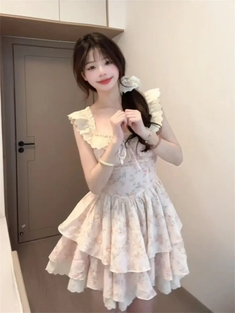 2025年新作 夏 花柄ワンピース レディース ノースリーブ フリルヘム レイヤードスカート スイートガール ハイウエスト スリム エレガント プリンセスドレス