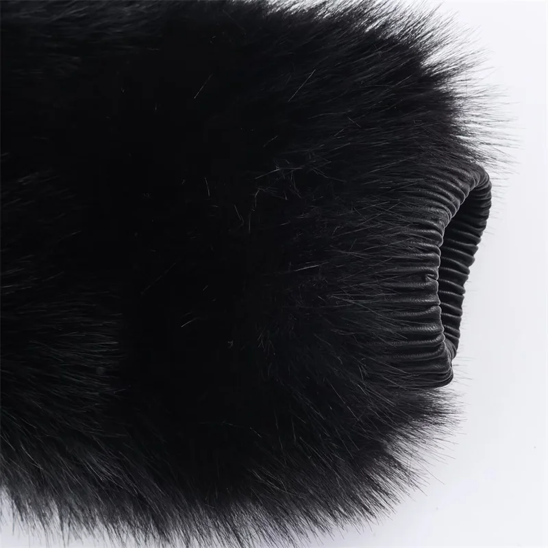 Abrigo de mujer 2025 invierno nuevo negro de manga larga efecto piel sintética cremallera cuello alto abrigo cálido moda de gama alta elegante