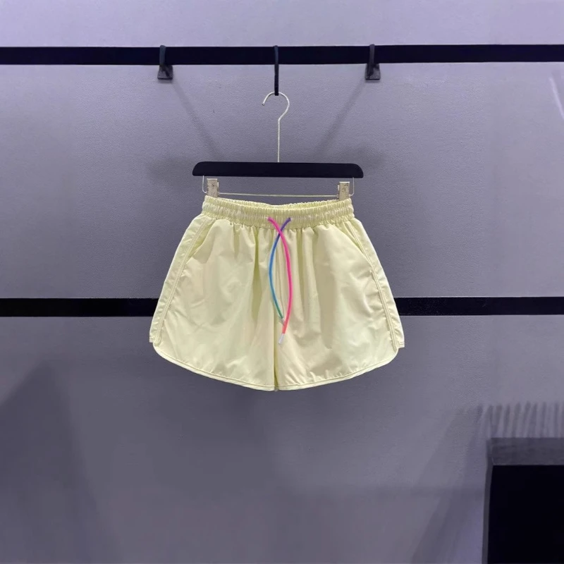 2025 Nuevos pantalones cortos de pierna ancha con cordón de color caramelo transpirable de algodón de verano para mujer