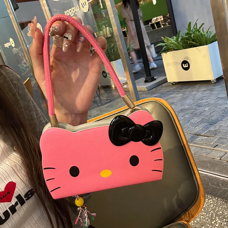 سانريو مرحبا كيتي لطيف بلون القط الكمون القوس قضية الهاتف آيفون 16 15 14 13 برو ماكس Y2K فتاة حزام اليد الغطاء الخلفي