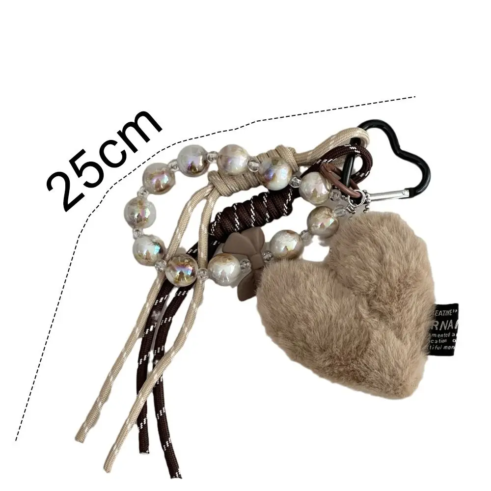 سلسلة مفاتيح مصممة على طراز ميلارد من الجلد البني سلسلة مفاتيح إبداعية طويلة بشرابة فاخرة ملحقات حقيبة الظهر المعلقة