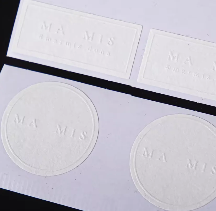 Customized stickers with 3D texture embossing, commercial label technology, and candles using art paper logos