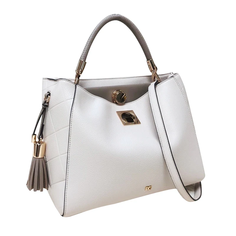 Hebilla de esqueleto PG con colgante de borla, nuevo diseño de marca, moda elegante, Popular bolso de mano para mujer, bolsos cruzados de nicho únicos