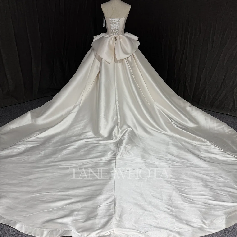 2025 Wedding Dress Sweetheart Sleeveless Beaded Sequined Lace-Up Back Bow Customized Elegant Bridal Gown