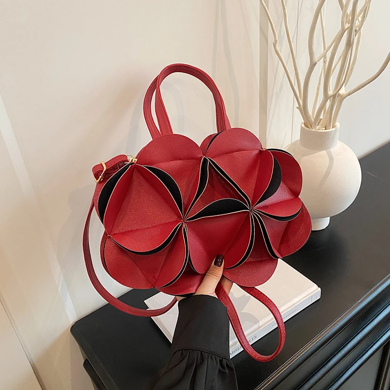 2026 High Quality Niche Bags Waterproof and Durable Design Sense Crossbody Bags PU Flowers Clock Shape Zipper Circular Bags