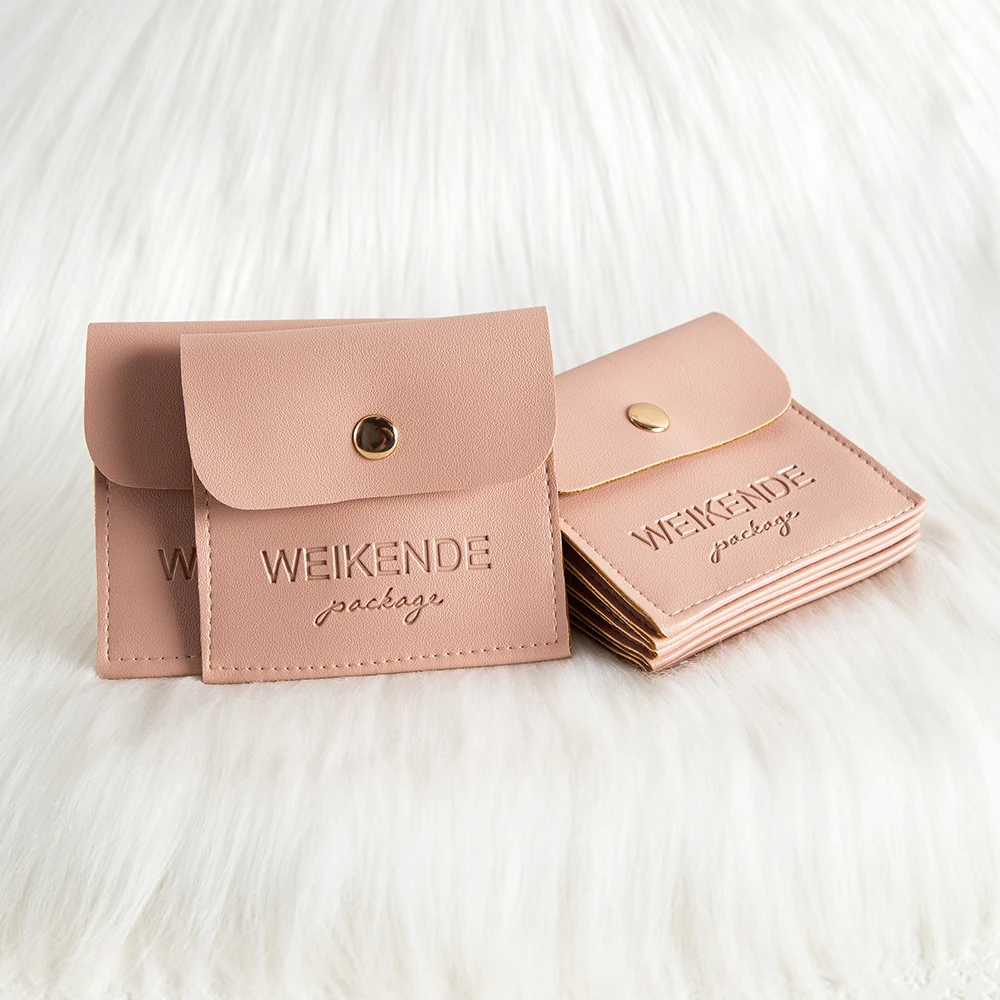 

50pcs Peach PU Leather Jewelry Gift Pouches with Snap Button Custom Logo Wedding Travel Organizer Boxes For Earrings Rings Beads