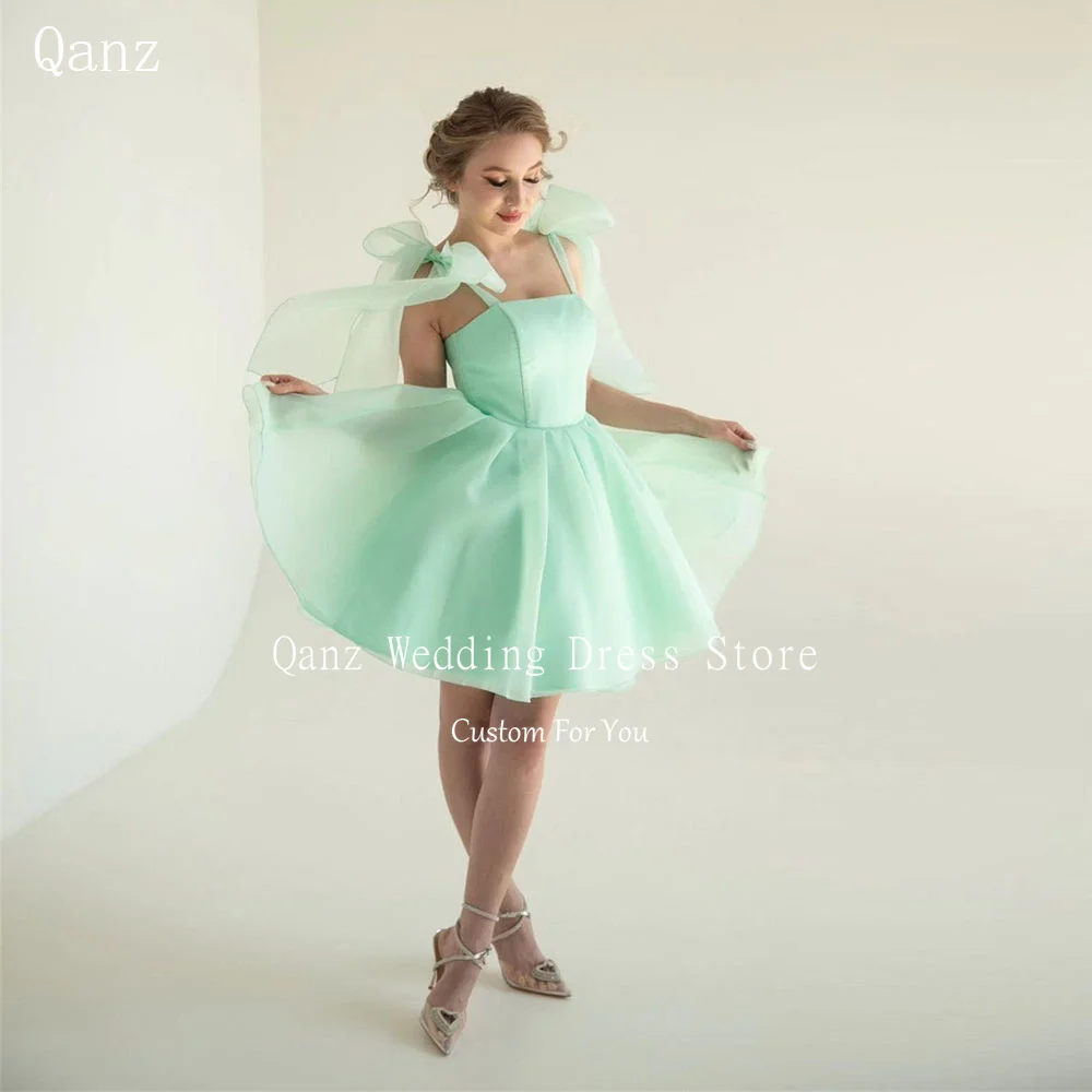 

Qanz Short Corset Homecoming Dress Mint Green Organza Mini Graduation Dresses for Youth Spaghetti Straps Bow Cocktail Gowns 2024