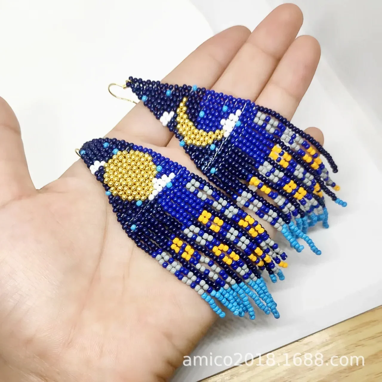 

Beaded earrings Tassel Geometry Moon Symmetry Design Hand knitting Originality Bohemia Alloy Tide Simple Rice bead earrings