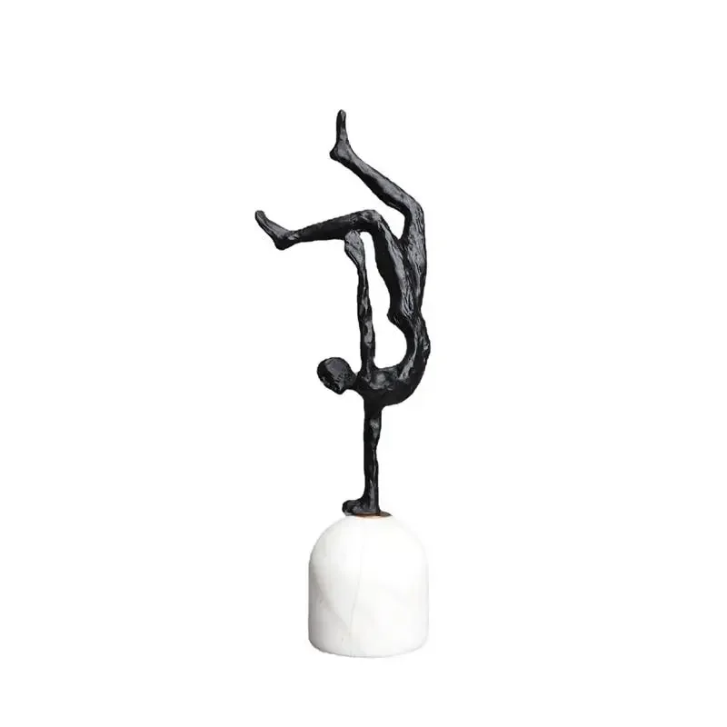 Sculpture humaine sur pied en fonte noire,