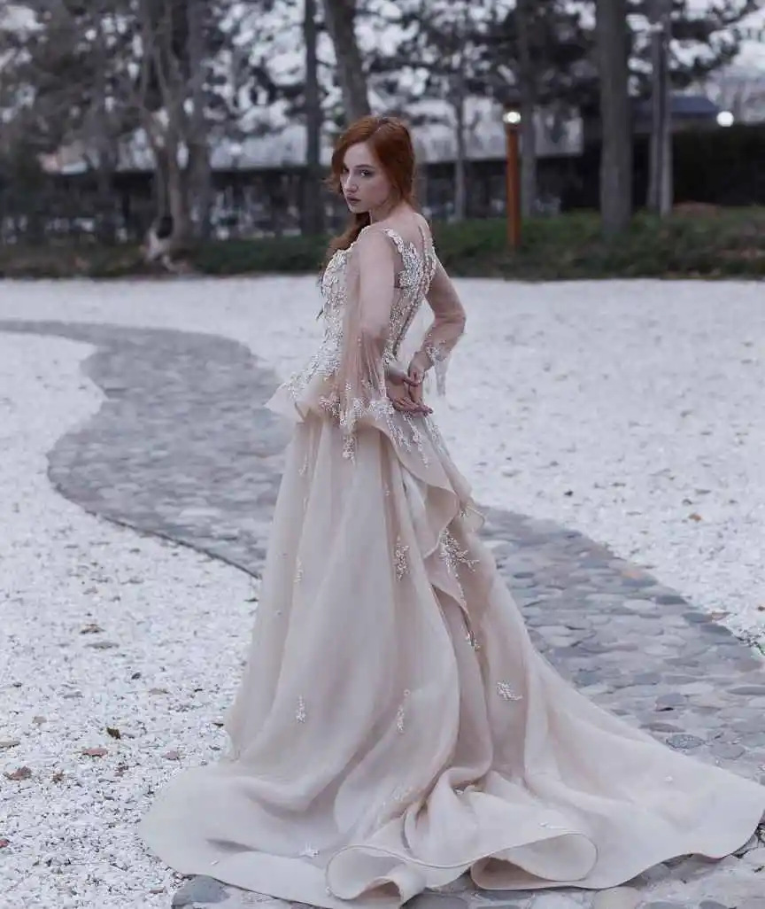 Elegant Lace Applique Bridal Gown Sequin Long Sleeve Ruffled Ball Gown Wedding Dress for Luxury Garden Weddings Customized
