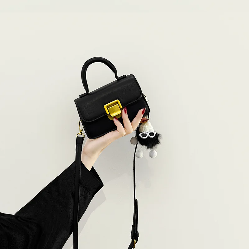 

This mini bag is a versatile and high-quality hand-held crossbody small square bag in a simple and solid color
