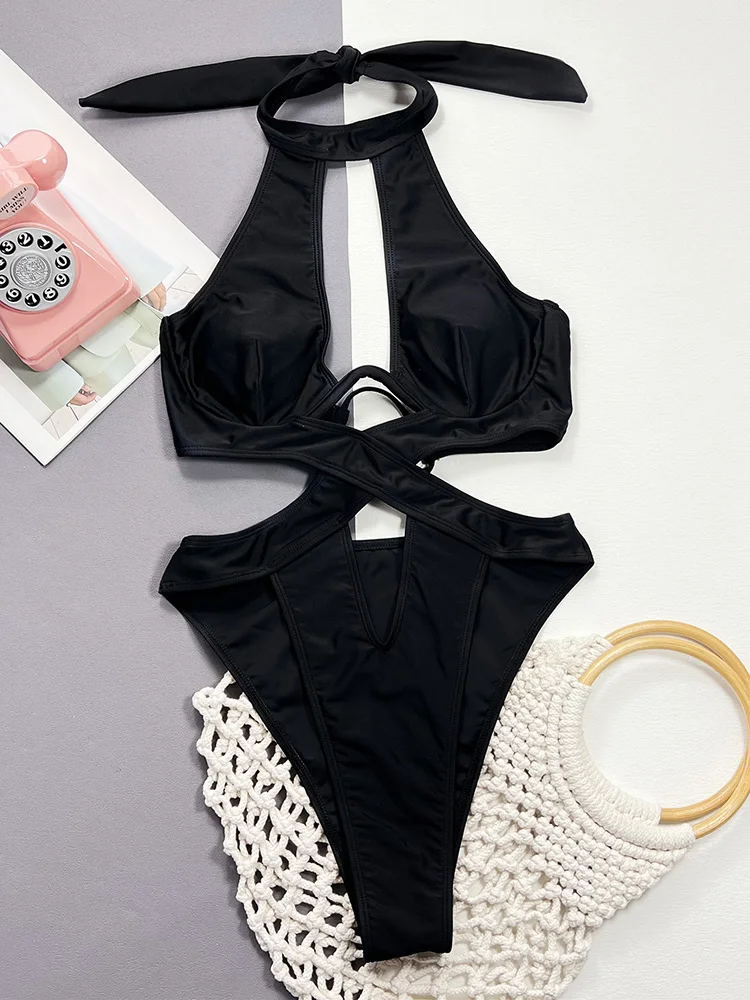 Bikini negro ahuecado para mujer, bañador Sexy de una pieza con cuello Halter, ropa de playa de realce, traje de baño sólido