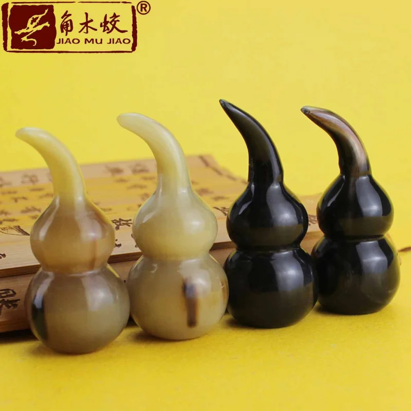 

Handmade gourd with crooked handle made from hornwood and yak horn, white cow horn gourd for handling and playing with