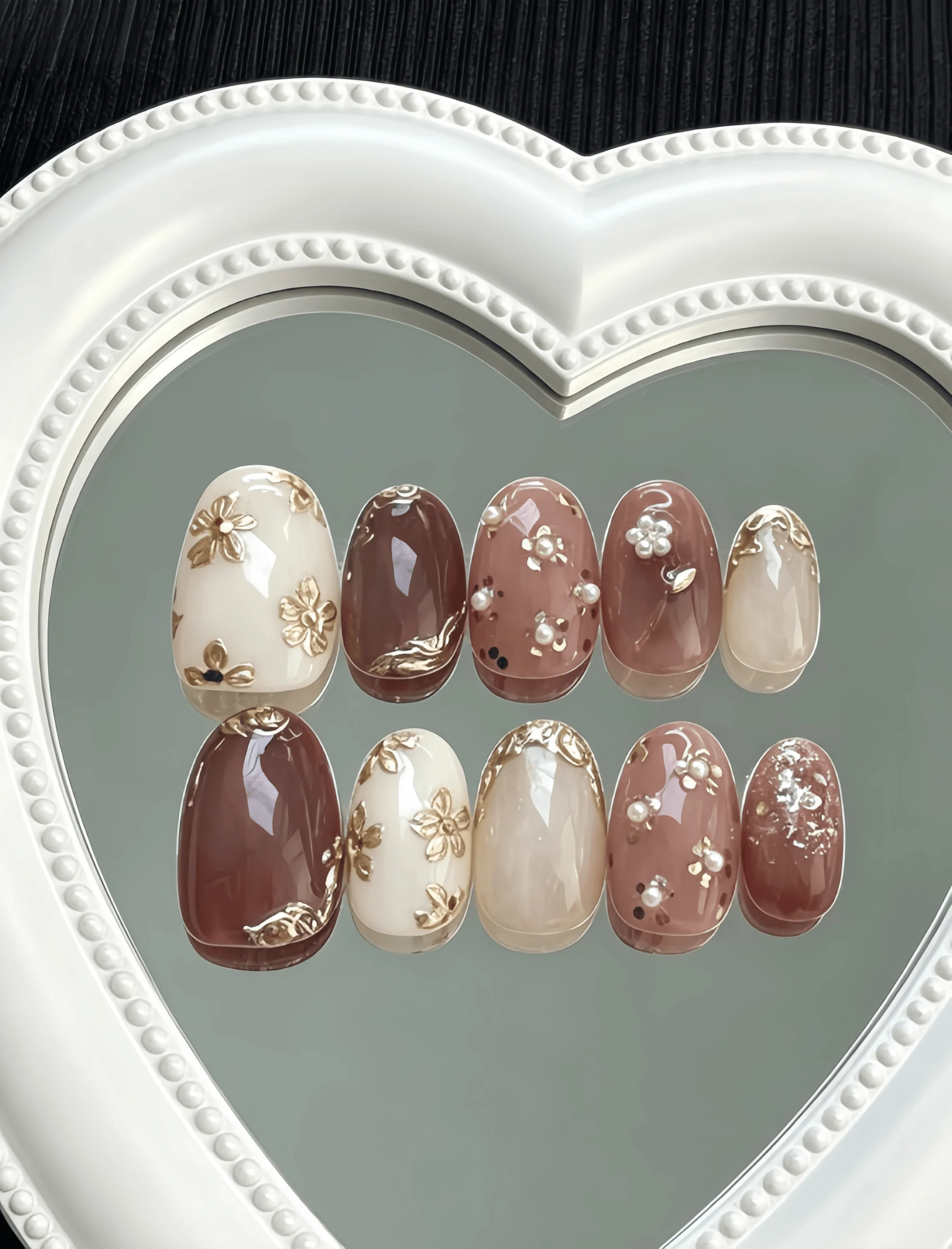 10 Pieces of Handmade Oval Full-Cover Nail Tips, Medium Length, Nude Pink Gradient with Gold Foil Flowers, Gold Foil Fragments, and Pearl Embellishments, Multi-Layered Finish, Wear-Resistant and Non-Fading, Gentle and Luxurious Style, Suitable for Women and Girls, Perfect for Summer Vacations, Graduation Season, and as a Gift, Includes 1 Piece of Jelly Glue and 1 Nail File