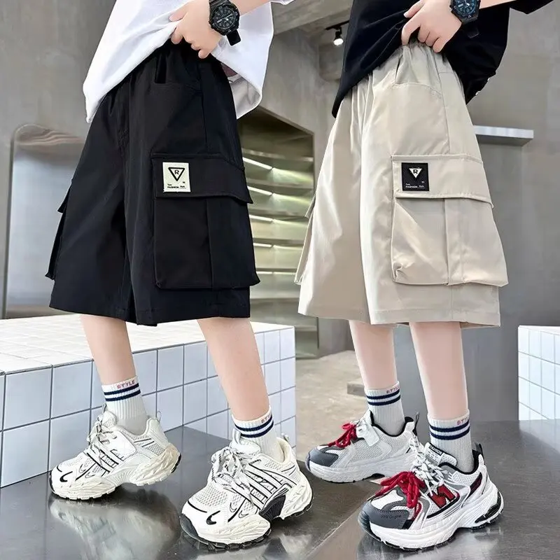 

Летние повседневные шорты для мальчиков и девочек, уличная мода, черные короткие штаны, детские спортивные штаны, детская одежда, новинка 2023 года