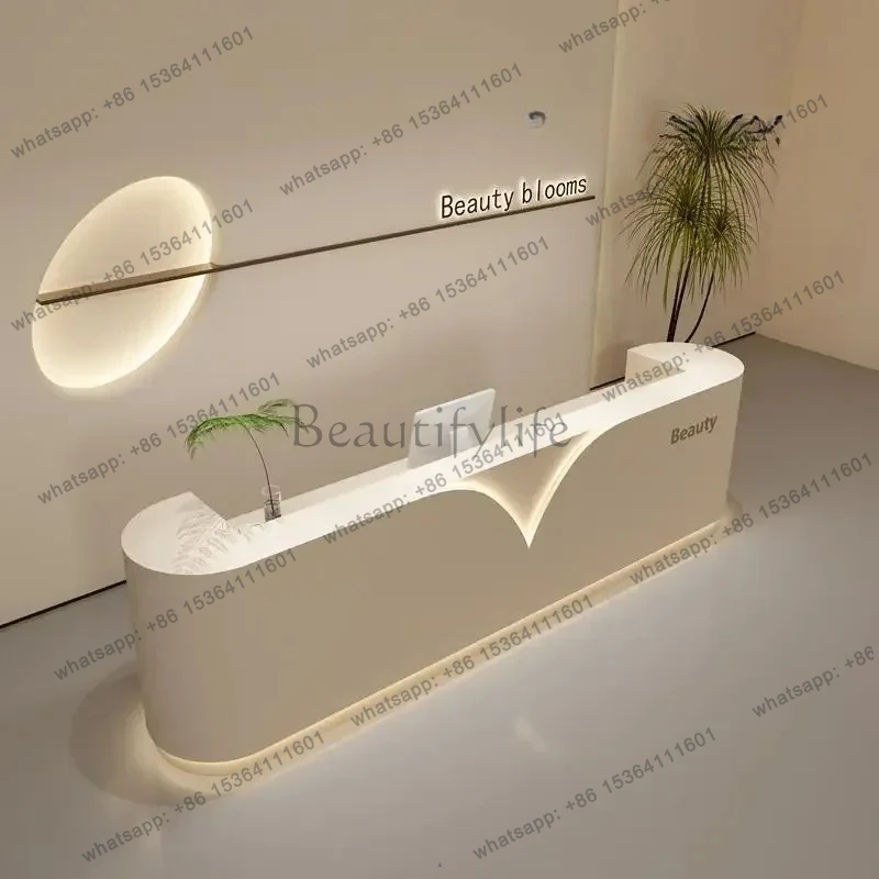 

09Warm color style beauty and skin care store bar table simple clothing store paint cashier light luxury fashion reception