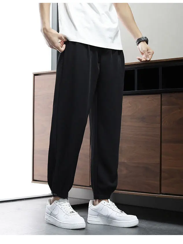 

Men's Summer Ice Silk Thin Nine Points Sports Casual Long Pants Loose Cuffed Drapey Small Suit Pants Comfortable Loose Fit