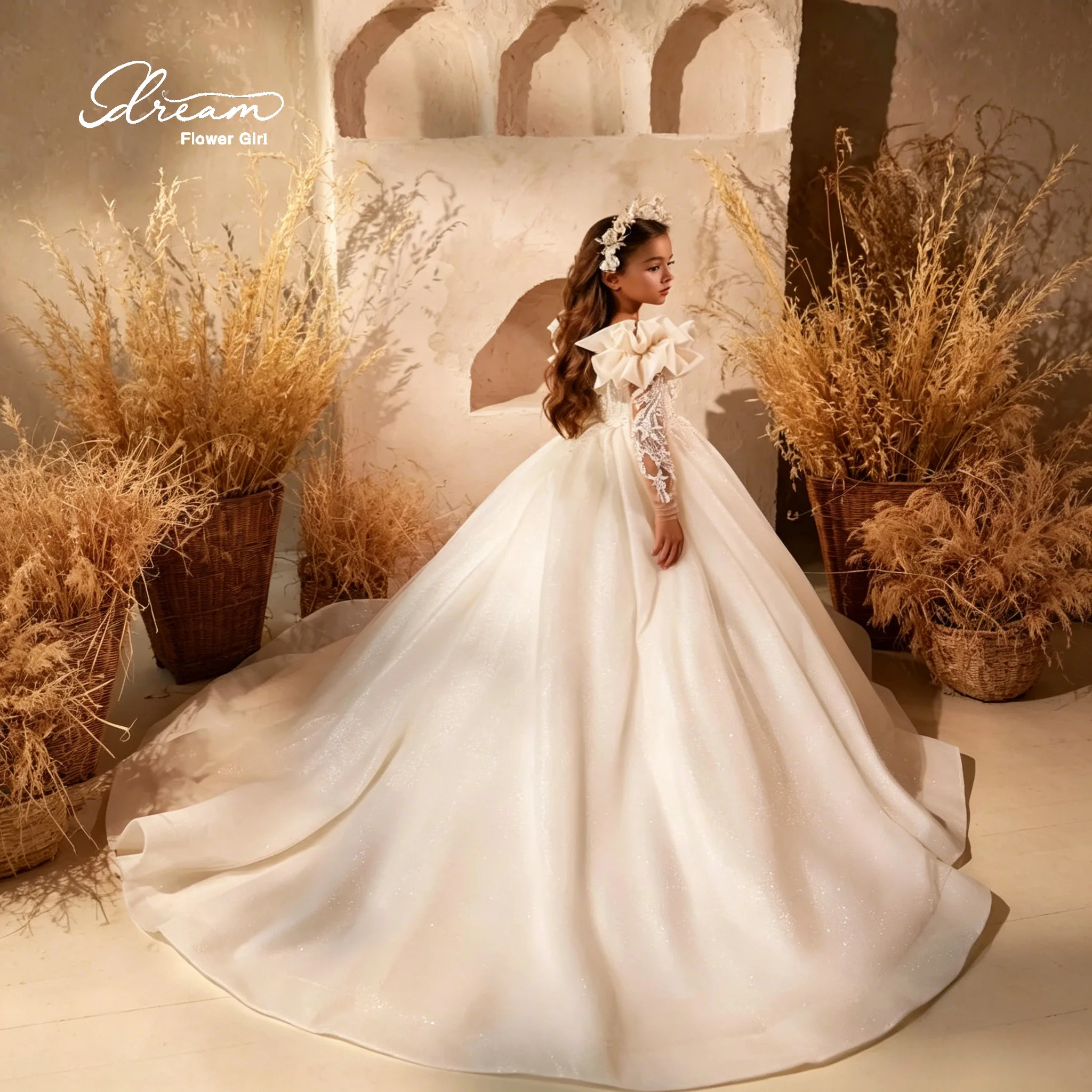Gorgeous ivory-colored strapless halter-style long dress with lace appliqués and floor-length fluffy skirt