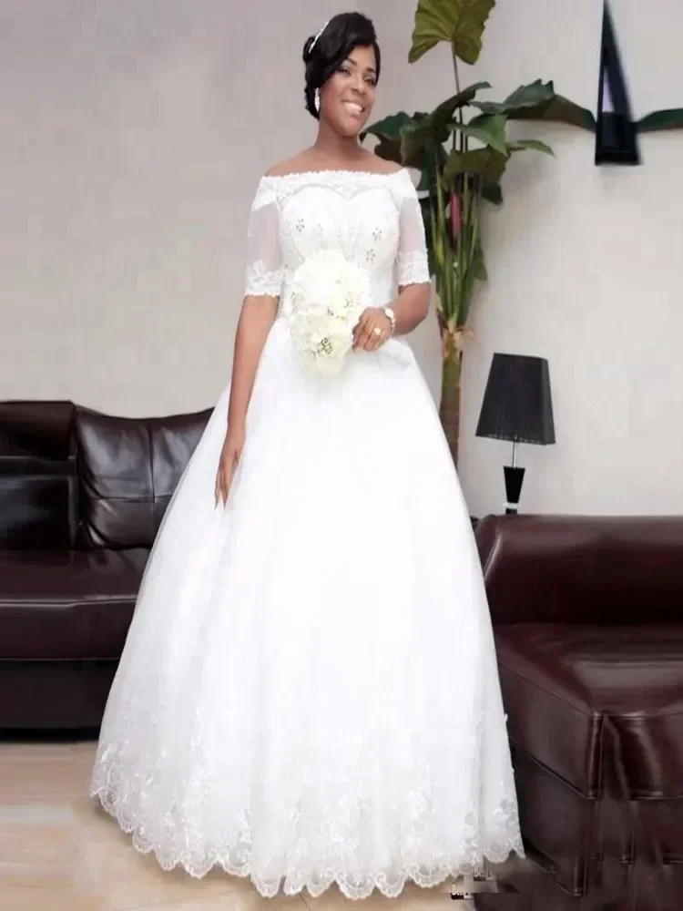 Aangepaste halve mouwen applicaties kristallen baljurk trouwjurk rechter trein Afrikaanse mode off-the-shoulder bruidsjurk