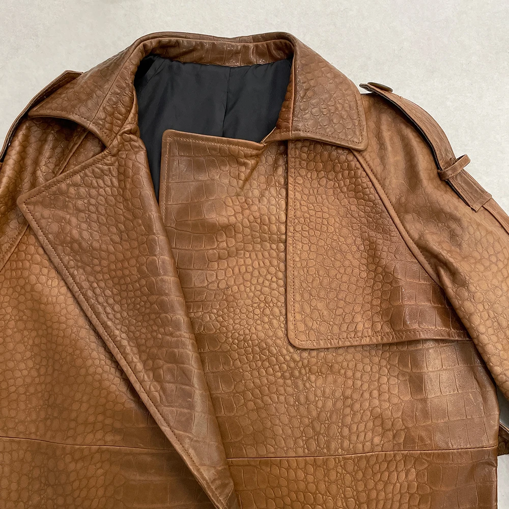 MENINA Penjualan Terlaris Mode 2025 Pakaian Kulit Asli Musim Semi Musim Gugur Baru Jaket Kulit Asli Sabuk Panjang Wanita Mantel Hitam Wanita