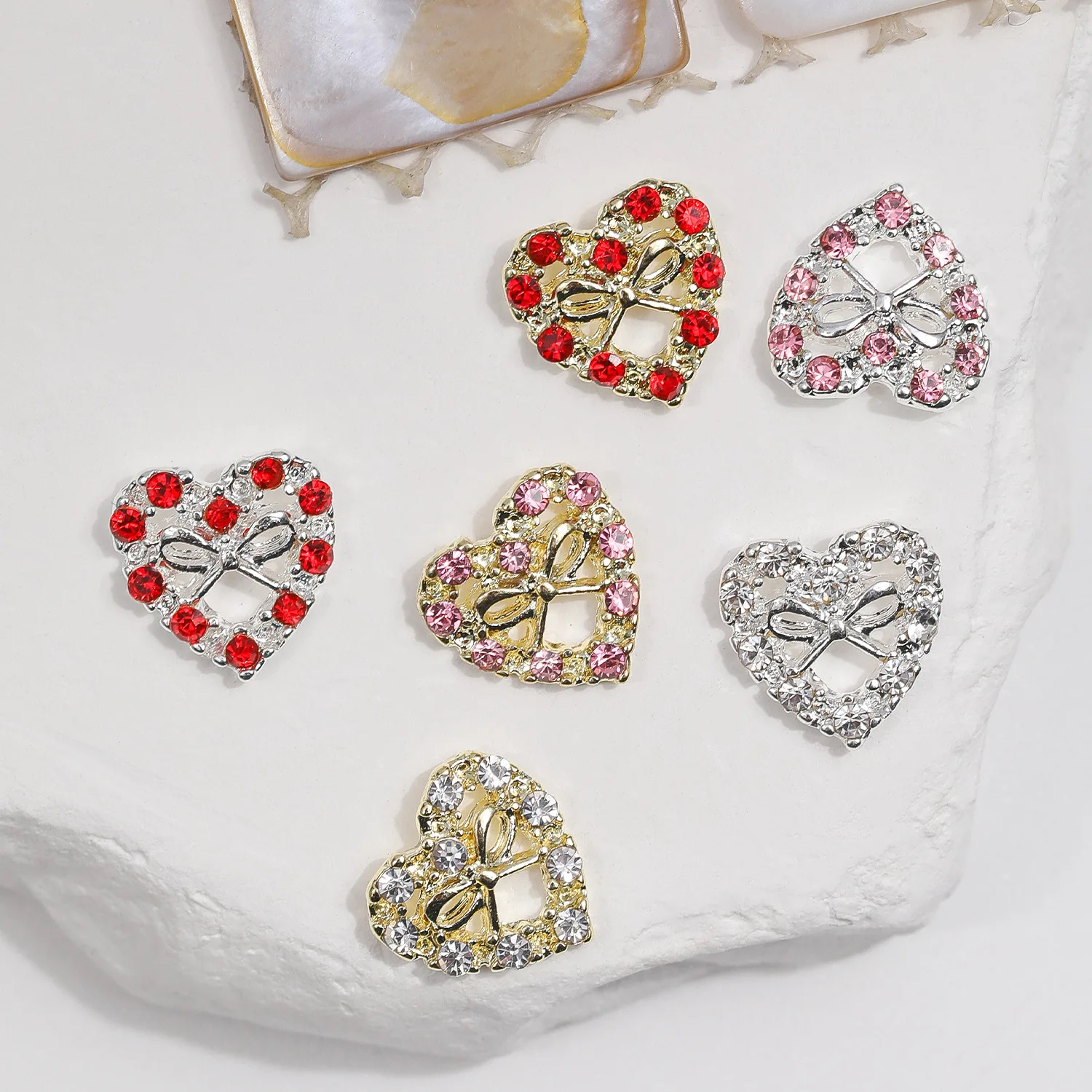 10 pièces 3D alliage de luxe évidé arc coeur Nail Art strass breloques manucure bijoux accessoires ongles décoration fournitures