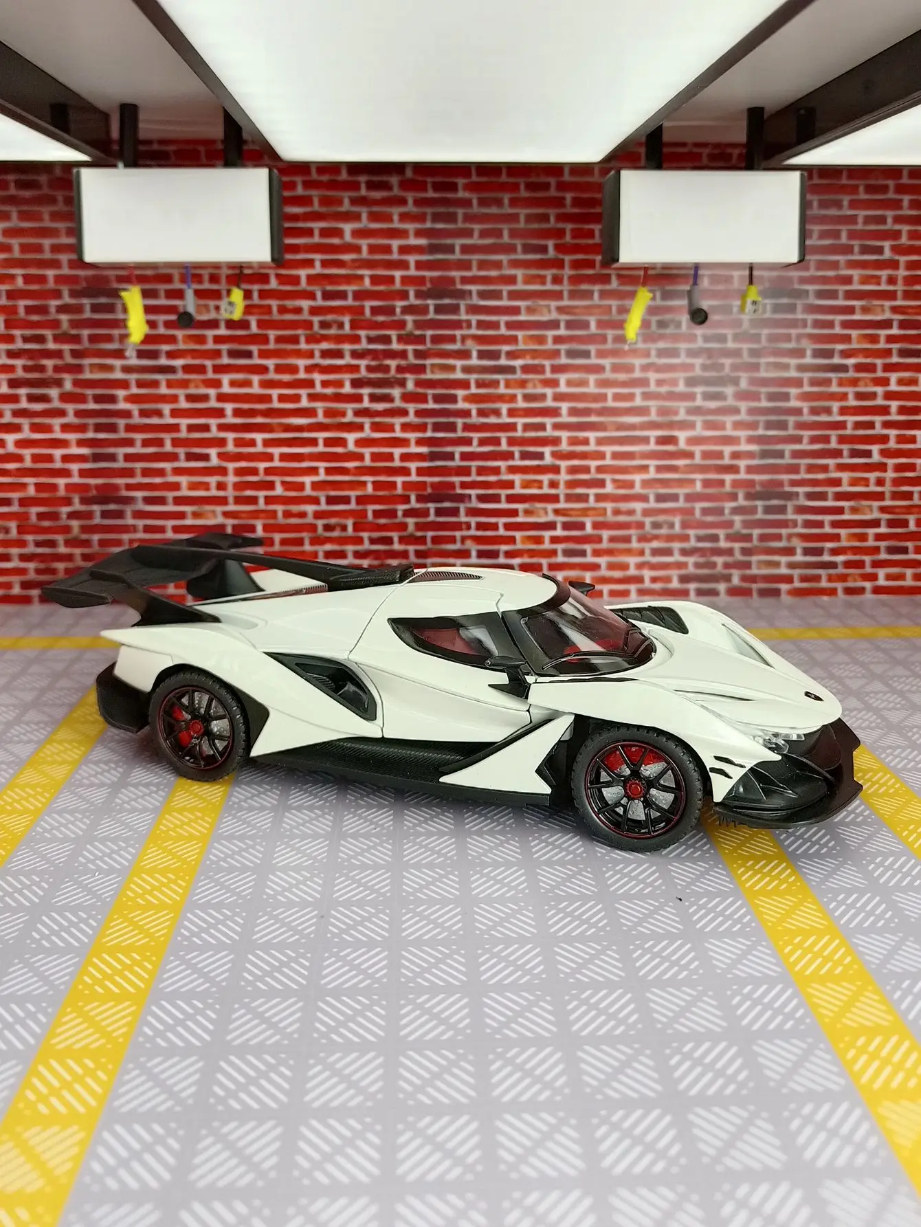 

1:24 ApolloIE super car alloy model car has sound and lighting functions doors can be opened rich details, fine workmanship