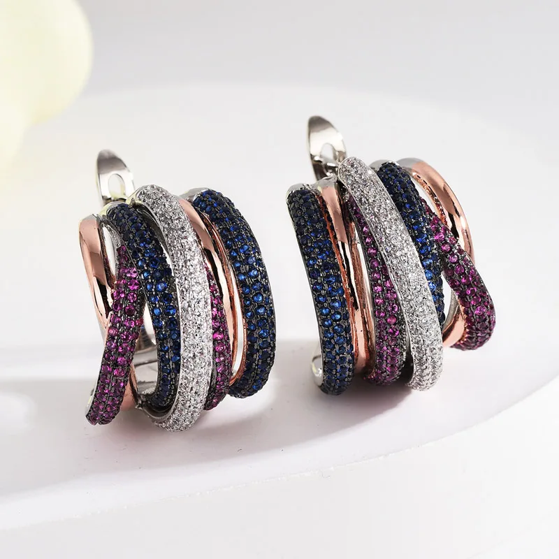 European and American Fashion Tri-Color Windi Titanium Steel Micro-Inlaid AAA Zircon Silver Needle Luxury Retro Earrings.