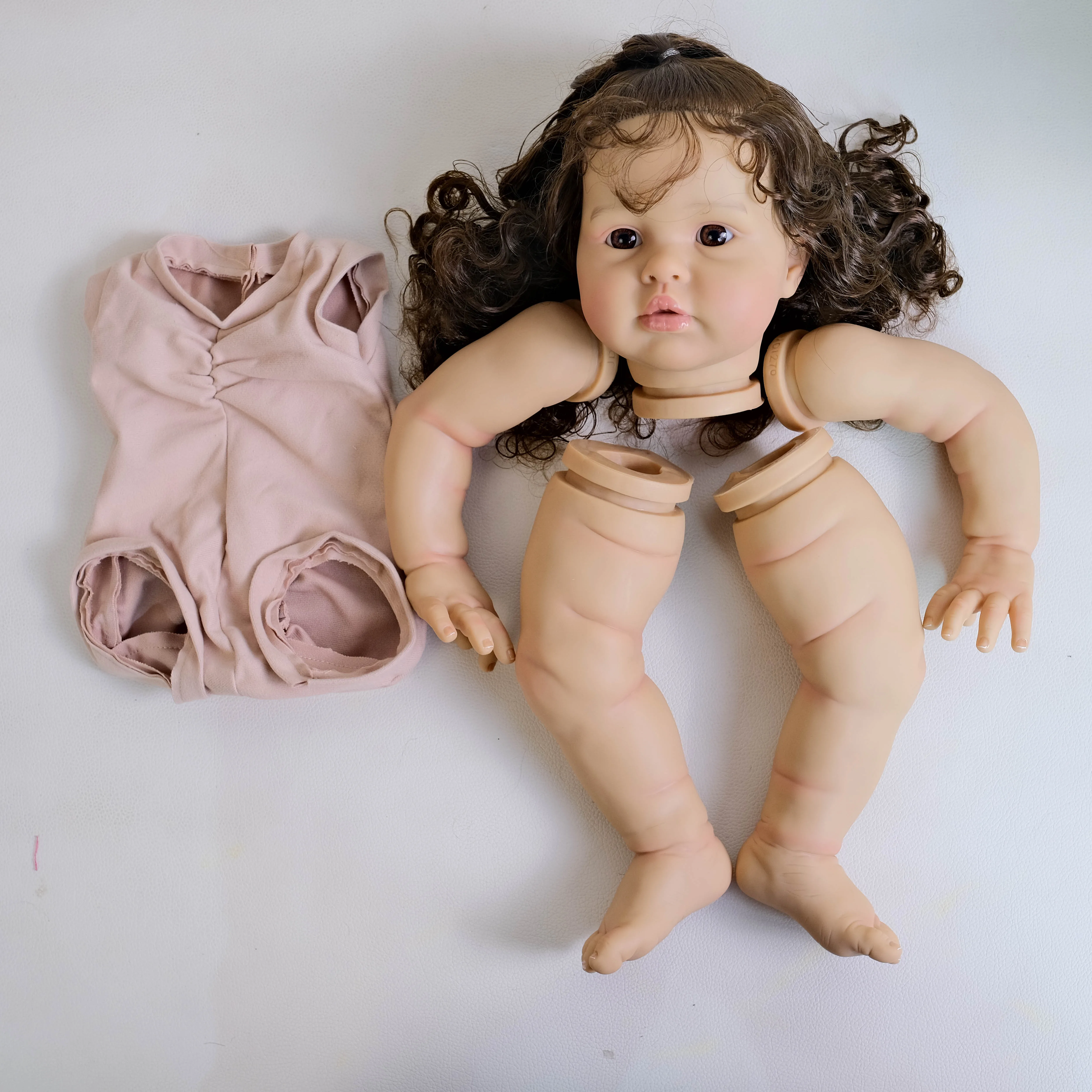 

NPK 24inch Ellie Lifelike Reborn Doll kit painted with Hand Rooted Hair Dark Brown Skin