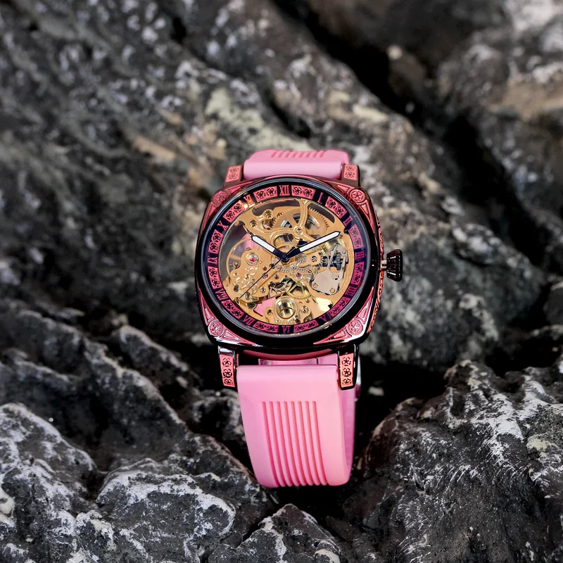 

Женские стильные и элегантные полые автоматические механические часы с розовой лентой и тонкой резьбой.
