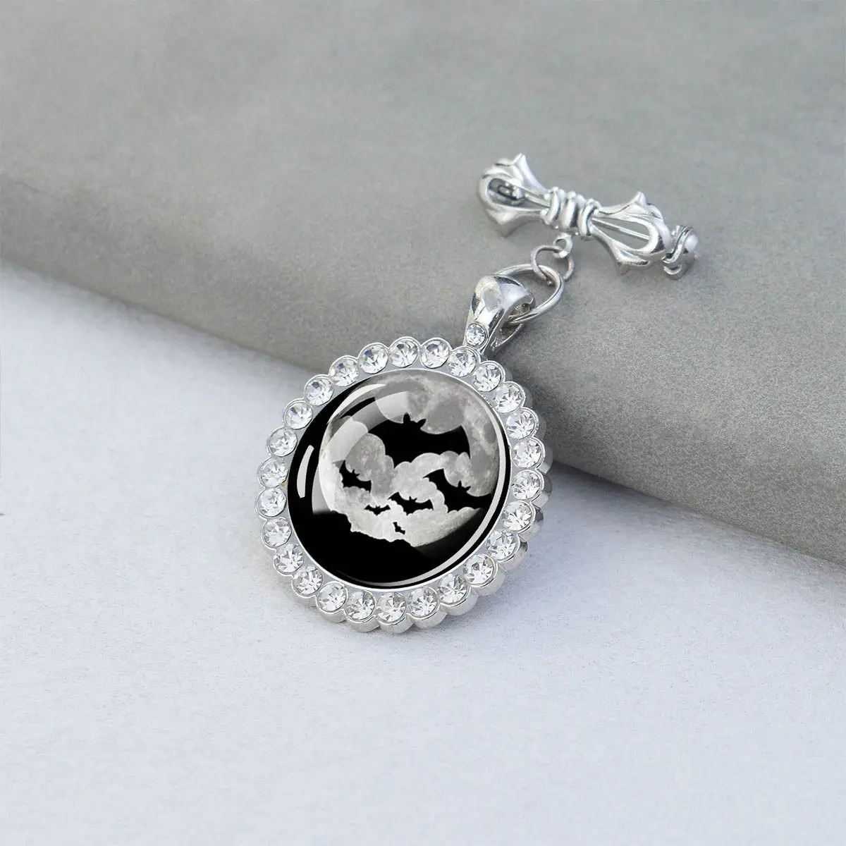 1PC Halloween themed bat and manifesto patterned glass brooch with synthetic zircon trim, suitable for holiday party gifts.
