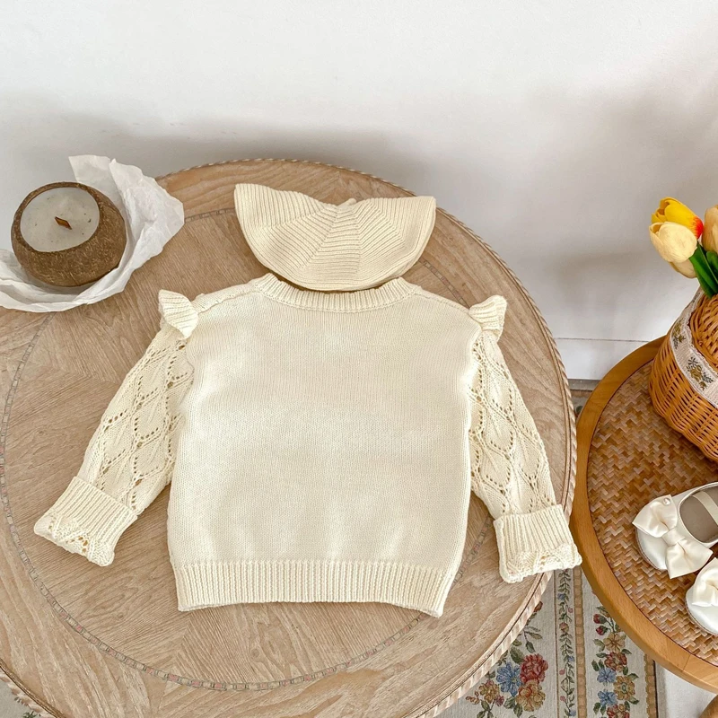 Autumn new style 0-3 year old baby clothing for girl handmade balls hollow out knitted coat long-sleeved cardigan