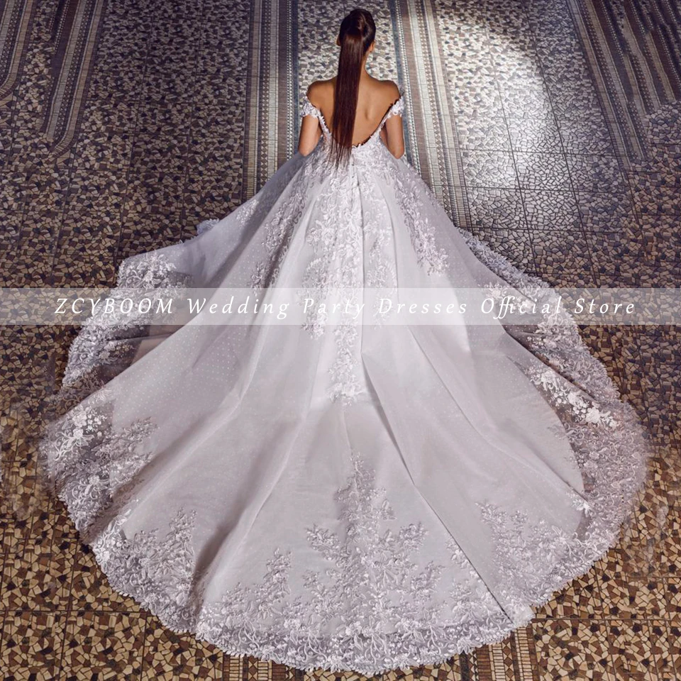 Abito da sposa personalizzato con scollo a V e applicazioni senza maniche con spalle scoperte 2025 Abito da sposa con lacci a trapezio lungo fino al pavimento