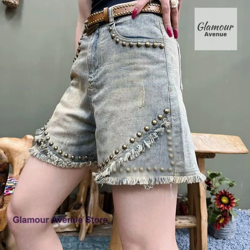 French retro heavy rivet denim shorts women's new summer fashion temperament loose and slim Joker casual wide-leg pants.