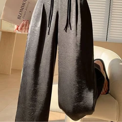 Chinese Style Satin Jacquard Wide Leg Pants with Button Closure for Women Featuring a Slim Waist and a Straight Leg for Casual