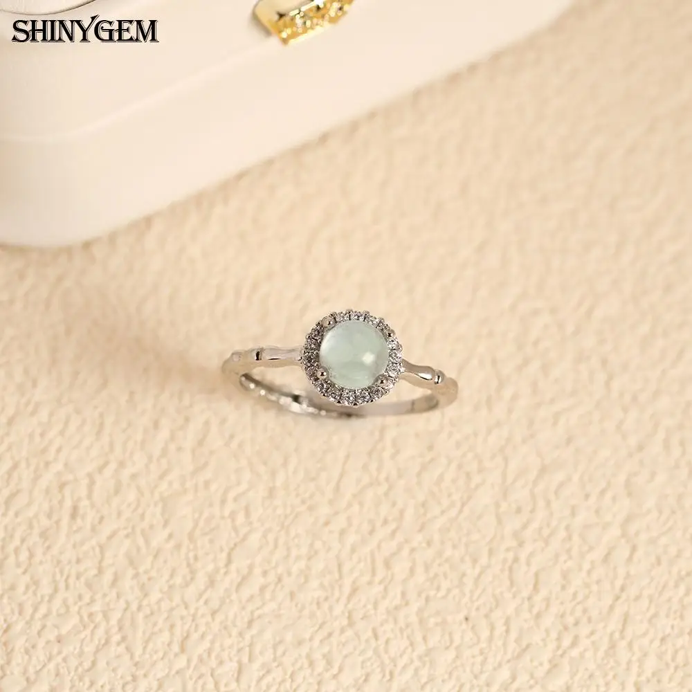 ShinyGem Women Aquamarine Round Natural Gemstone with Zircon Halo Blue Strawberry Crystal Jewelry Resizable Platinum Plated Ring