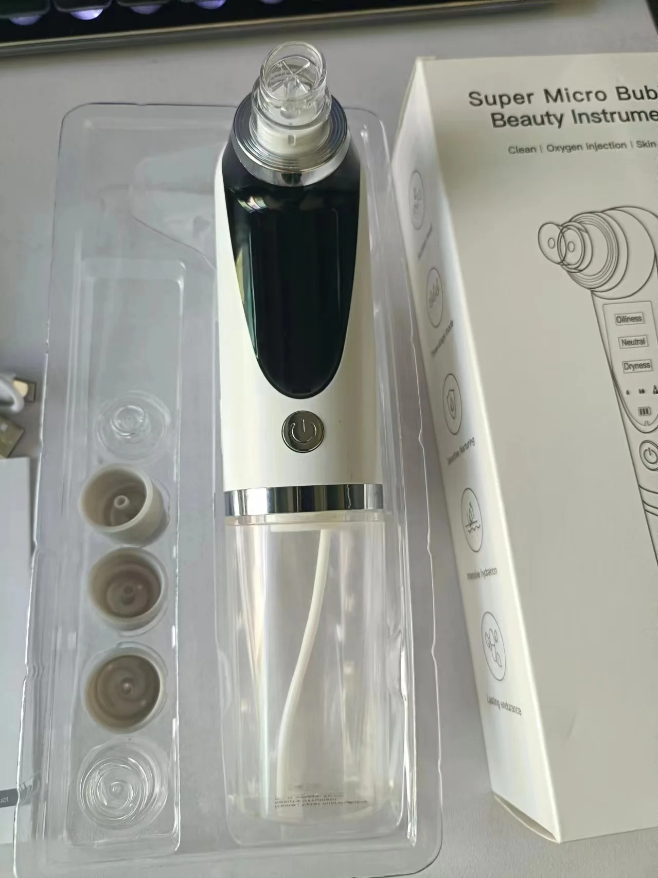 Livraison directe en gros dissolvant de points noirs électrique dissolvant noir pores aspirateur Micro petite bulle Cycle d'eau Rechargeable