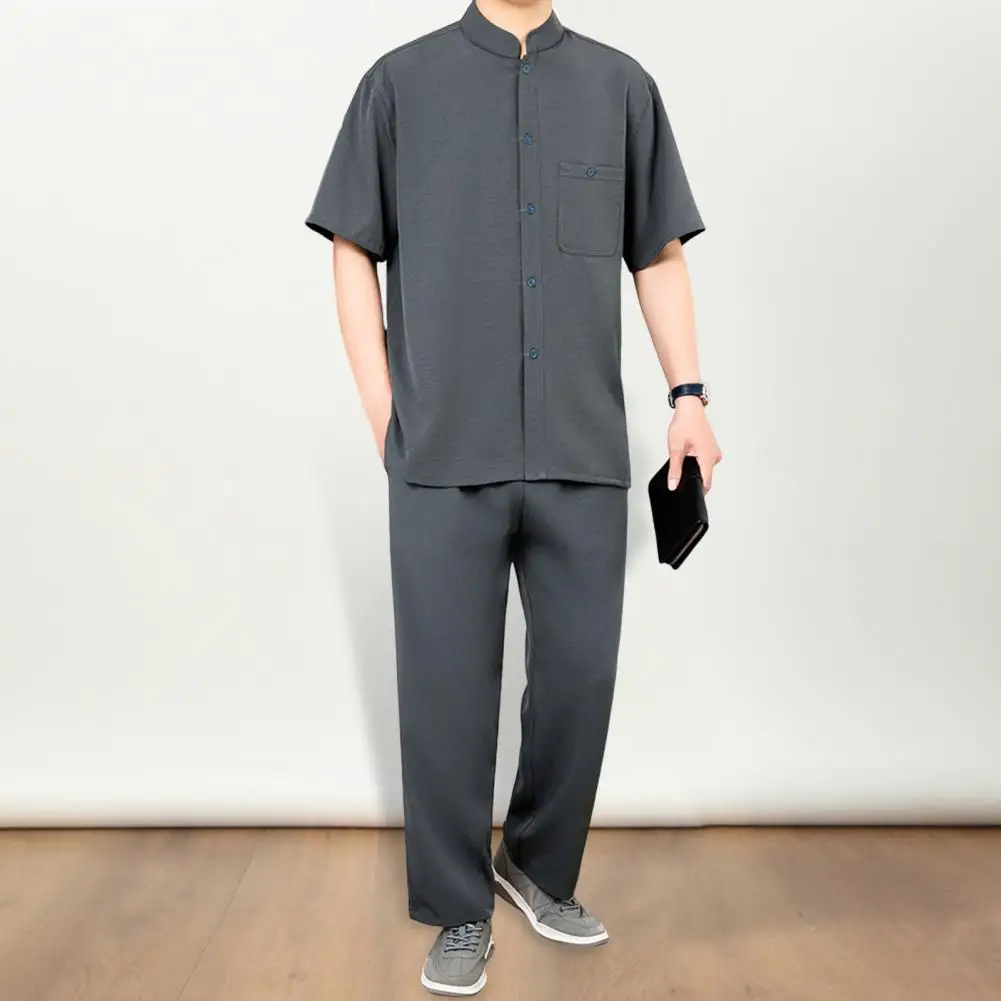 Conjunto de 2 unidades de traje para hombre con cuello levantado, camisa de manga corta con una botonadura, pantalones largos con cintura elástica, conjunto de Color sólido, corte holgado, ocio