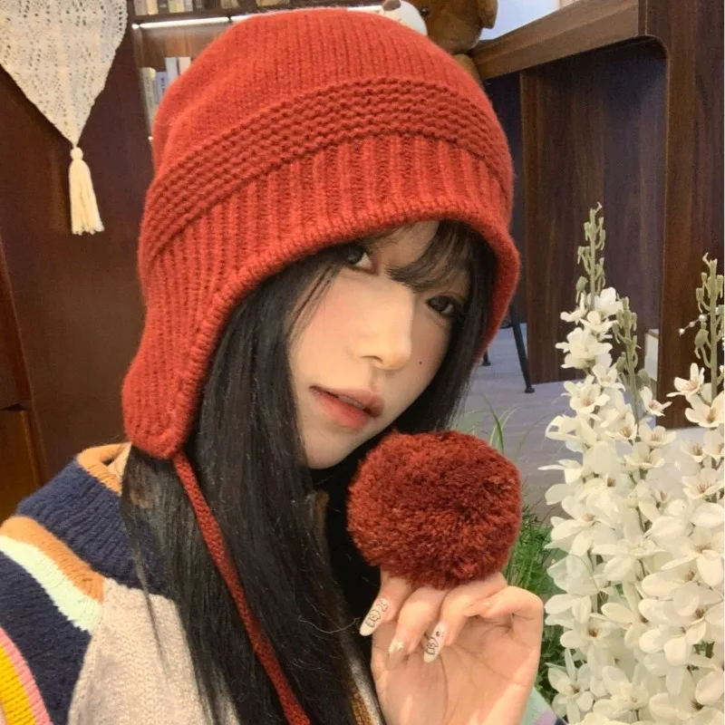 

Японские нишевые дизайнерские шапочки для защиты ушей на шнуровке для женщин, осенние и зимние теплые универсальные шерстяные вязаные шапки высокого качества