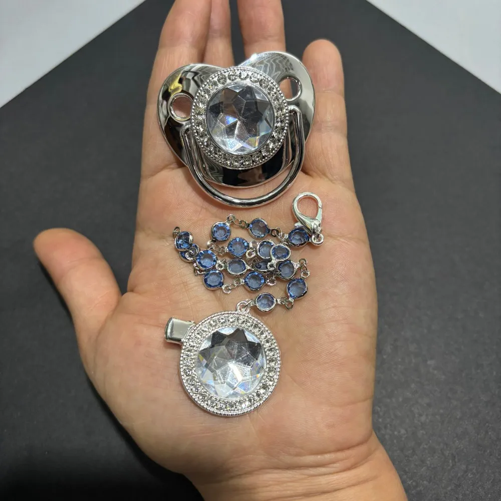 

Cute newborn suckles grandma's mouth Baby chews on a food-grade silicone pacifier A gift for the newborn pacifier clip 0-12M