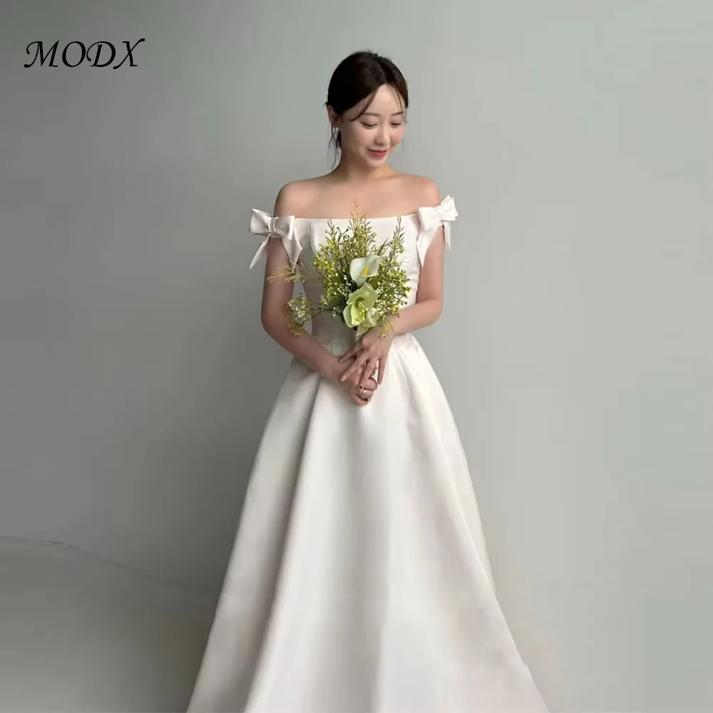 

MODX Элегантные свадебные платья трапециевидной формы с открытыми плечами и рукавами с бантом из атласа длиной до пола, корсет сзади, свадебные платья на заказ