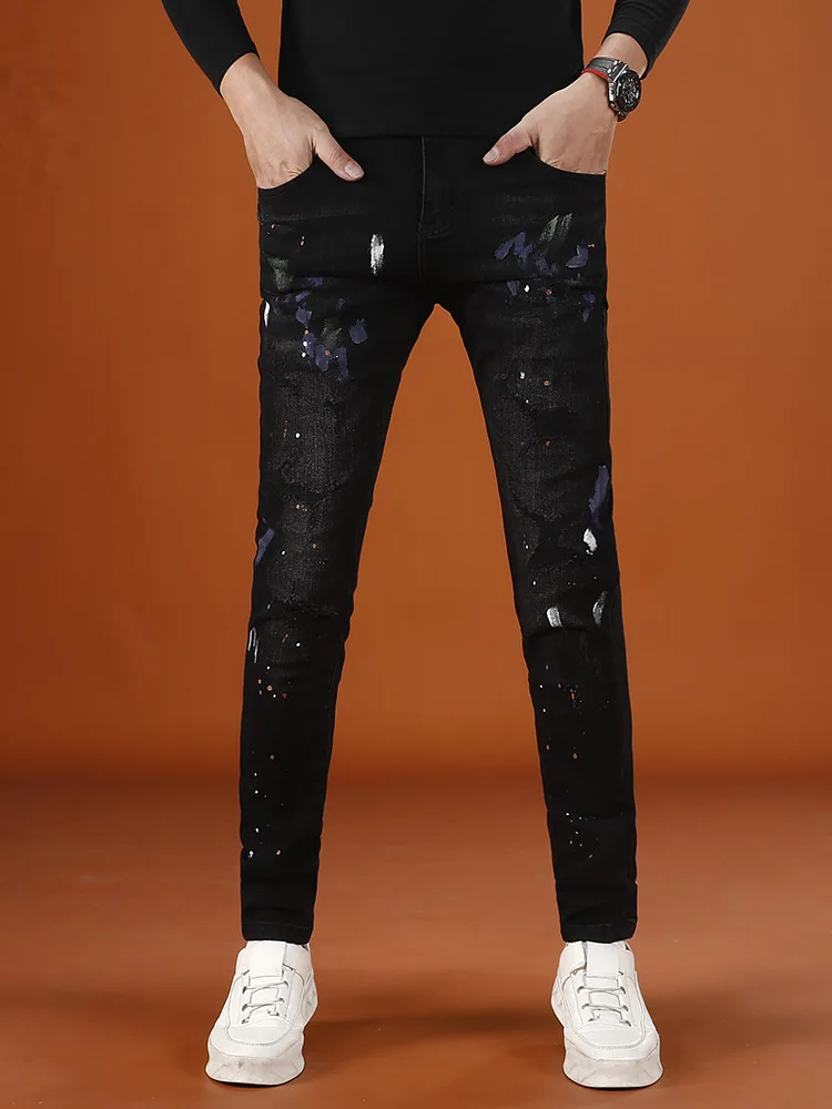 

Paint printed ripped jeans men's 2025 autumn new item elastic small foot trendy street handsome men's pants
